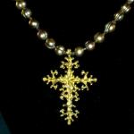Item N5 . Gold fresh water pearl - 10mm- strung with bronze seed beeds, accented with Swarovski crystals - Bronze Spanish Byzantine cross by Dan Riccio - 18" length plus 2" cross pendant- ($175 plus $5.20 S/H)